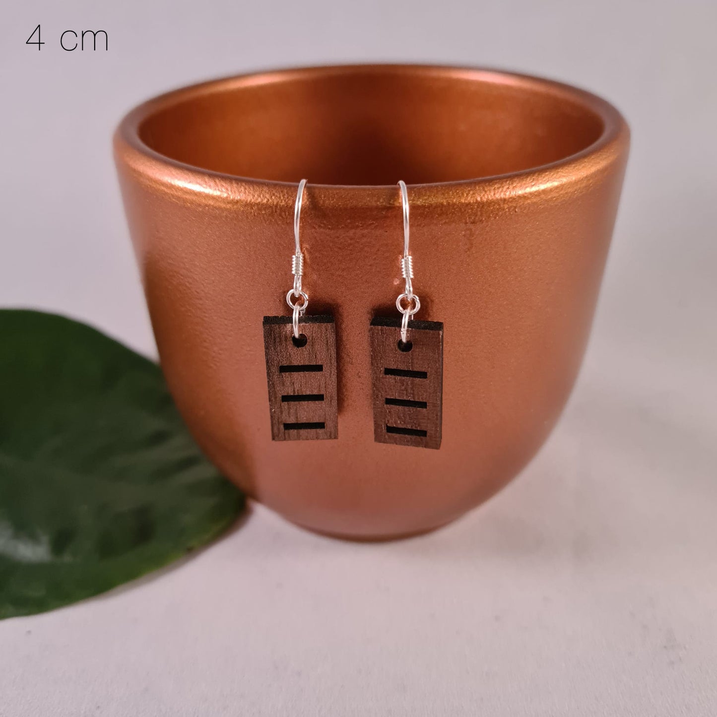 Houten staafjes met horizontale streepjes